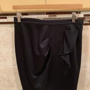 {3/$30} Tahari black skirt with ruffle accent